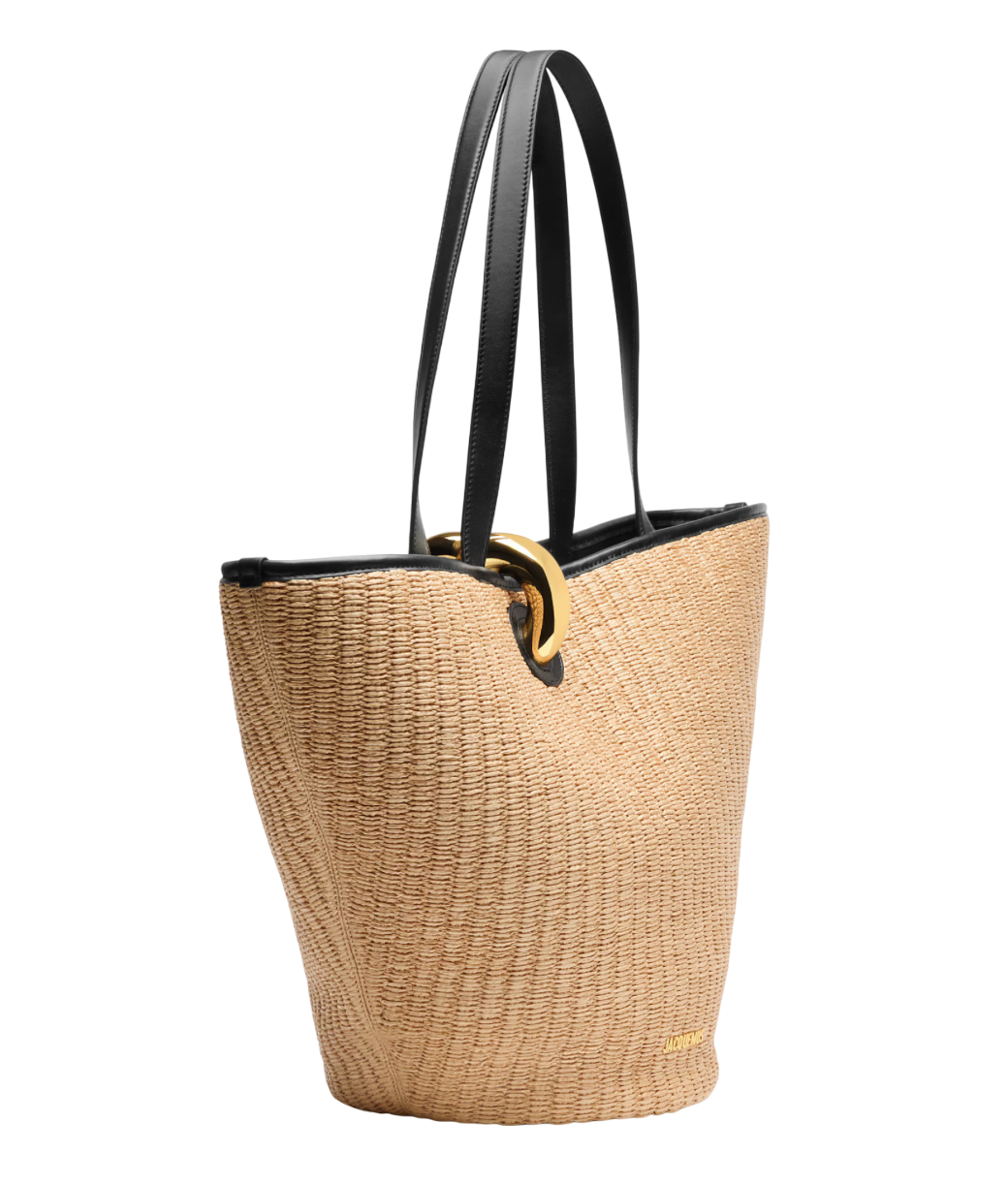 Asymmetric faux-raffia bucket bag with smooth leather trim and gold ring clasp, height 60cm.